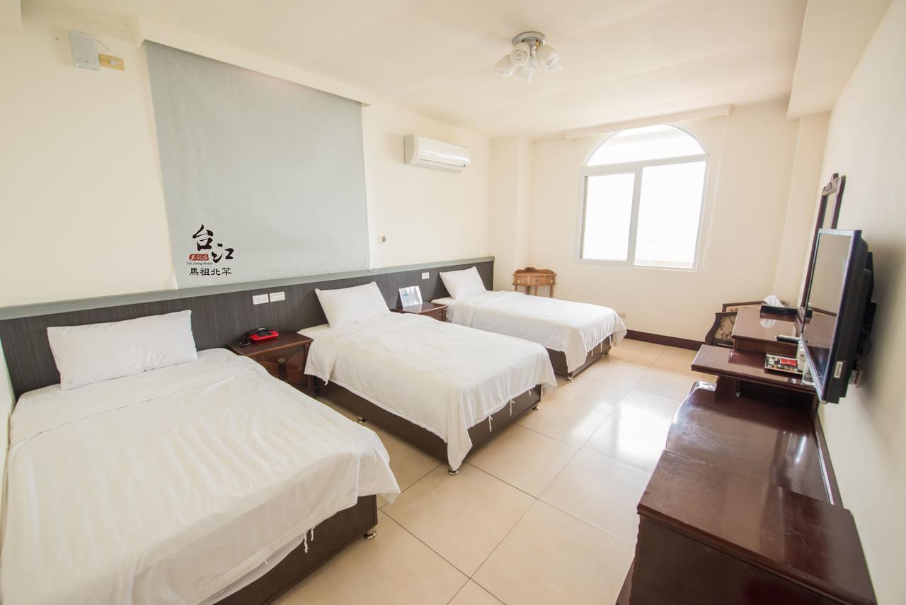 Taijing Hotel Beigan Bagian luar foto