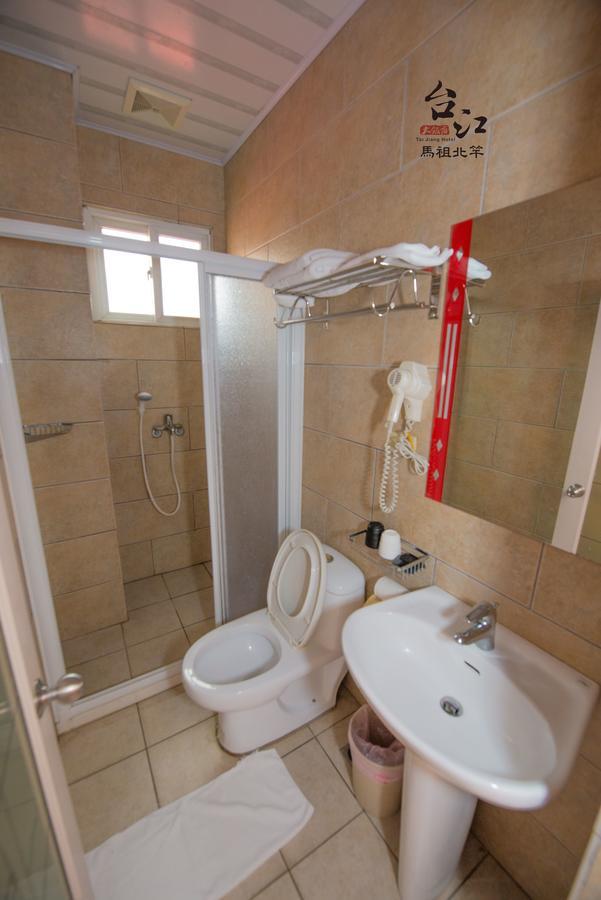 Taijing Hotel Beigan Bagian luar foto